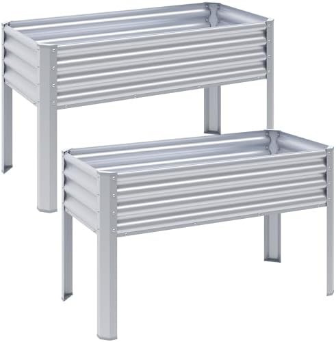 Two silver elevated galvanized steel planters